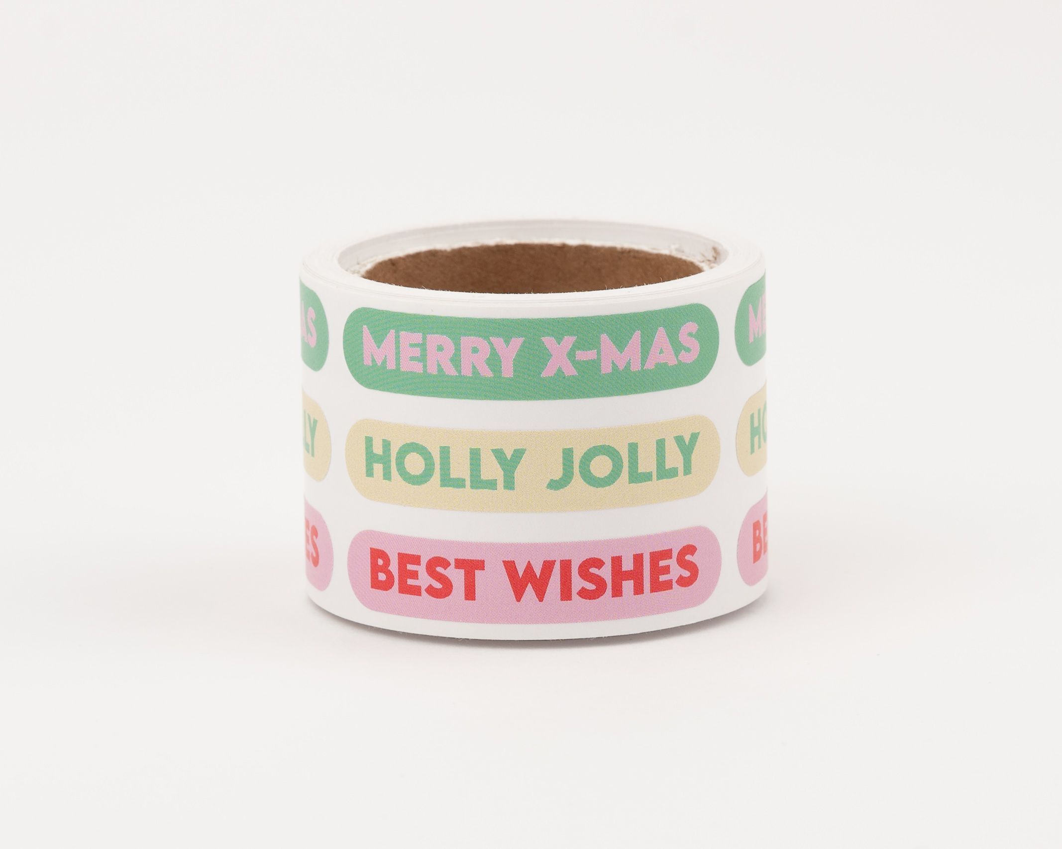 Aufkleber mit verschiedenen festlichen Designs. Rosa, Rot, Grün, Pink und Elfenbein kombiniert mit Weihnachtsgrüßen