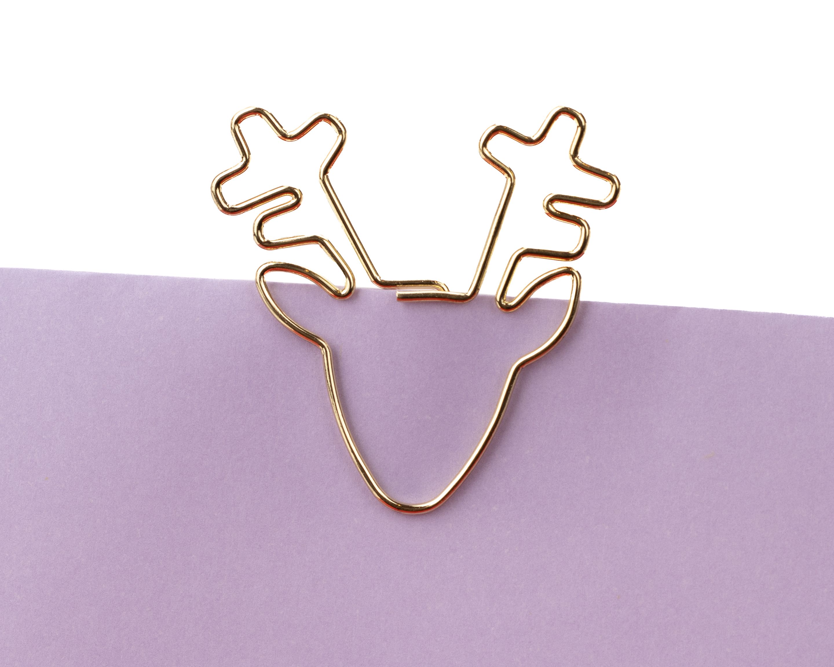 Goldfarbene Design-Clips aus glänzendem Metall in der besonderen Form eines Rentierkopfes