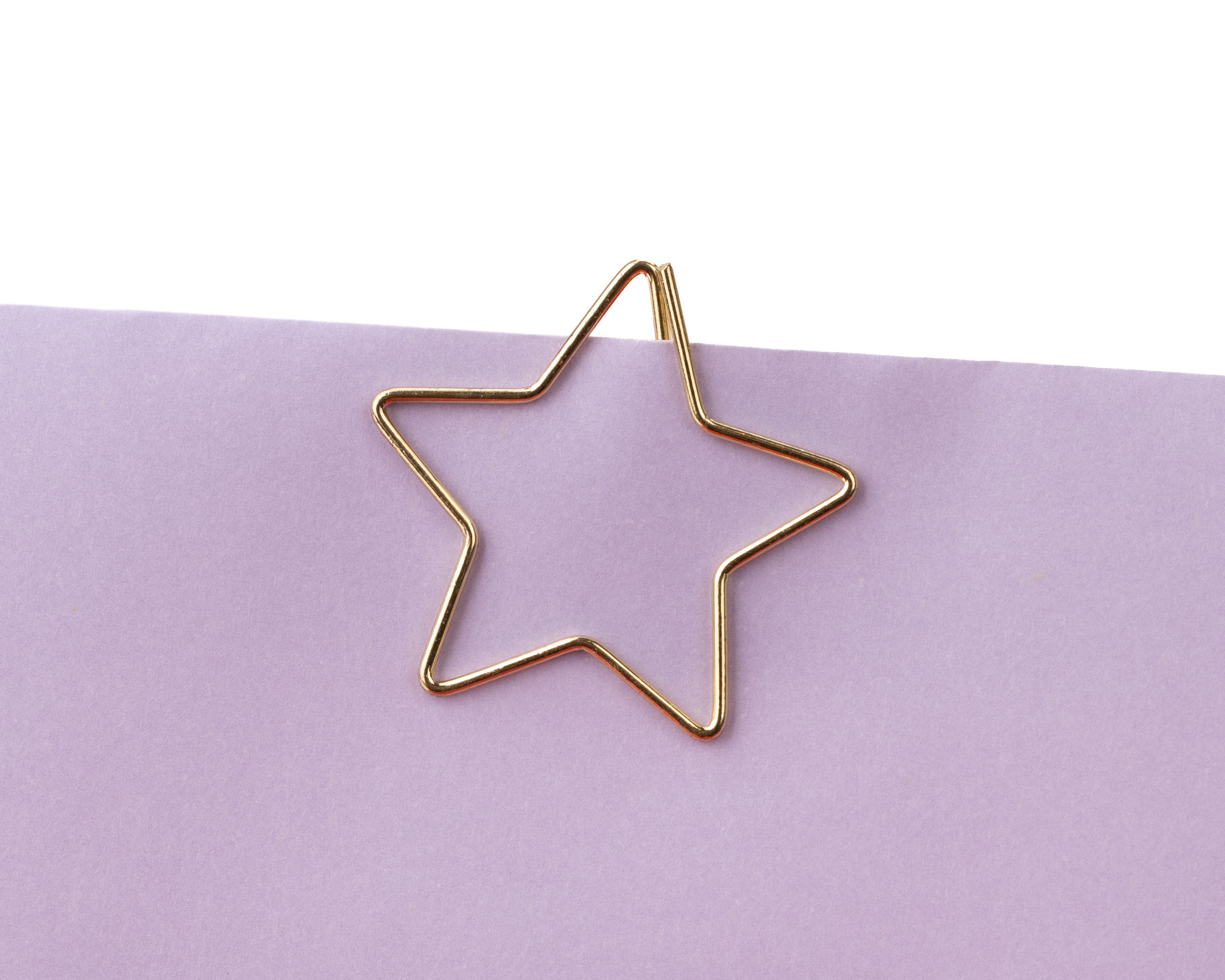 Design-Clips aus Metall in goldener Sternform