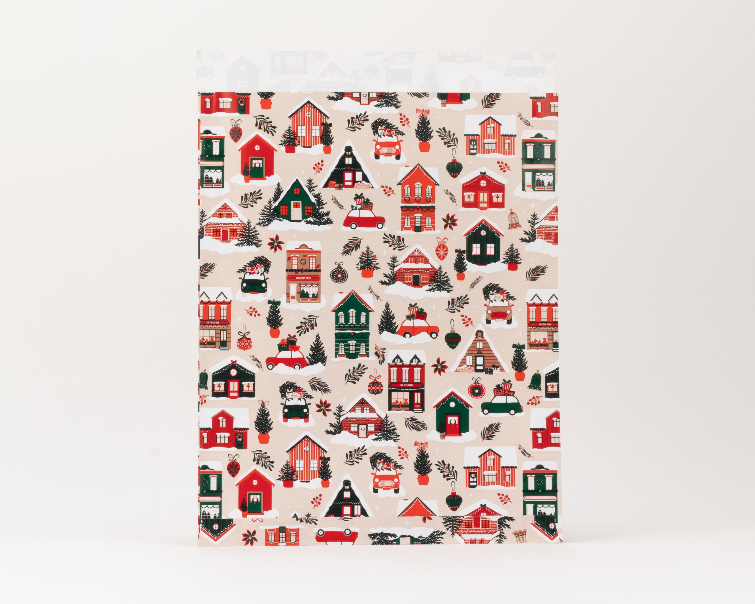 Papiertüten Flachbeutel mit Winterdorf-Motiv. Auf beigem Grund sind bunte Häuser, Tannenbäume und Fahrzeuge. Die Innenseite ist weiß.