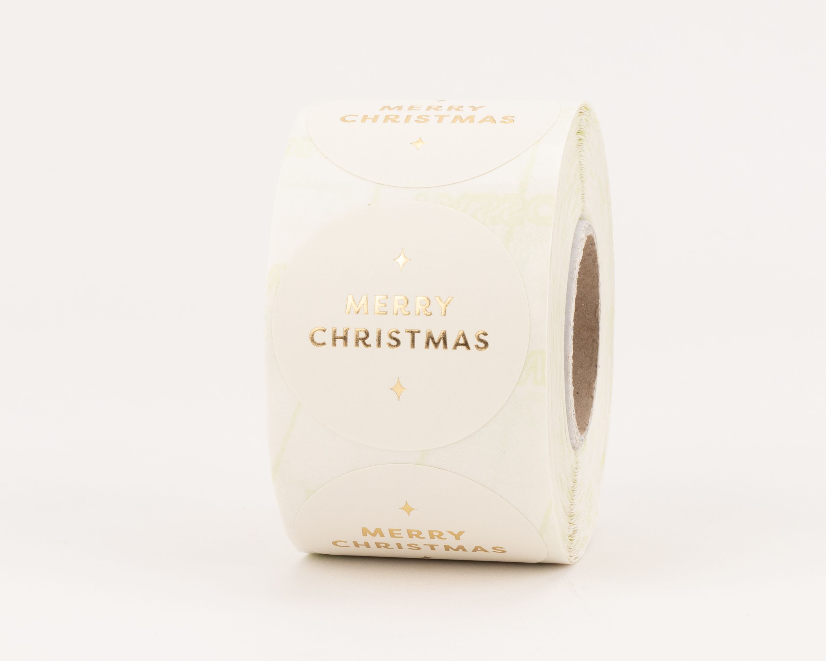 Runde Aufkleber mit goldener Merry Christmas Aufschrift und kleinen Sternen auf weißem, mattem Papier