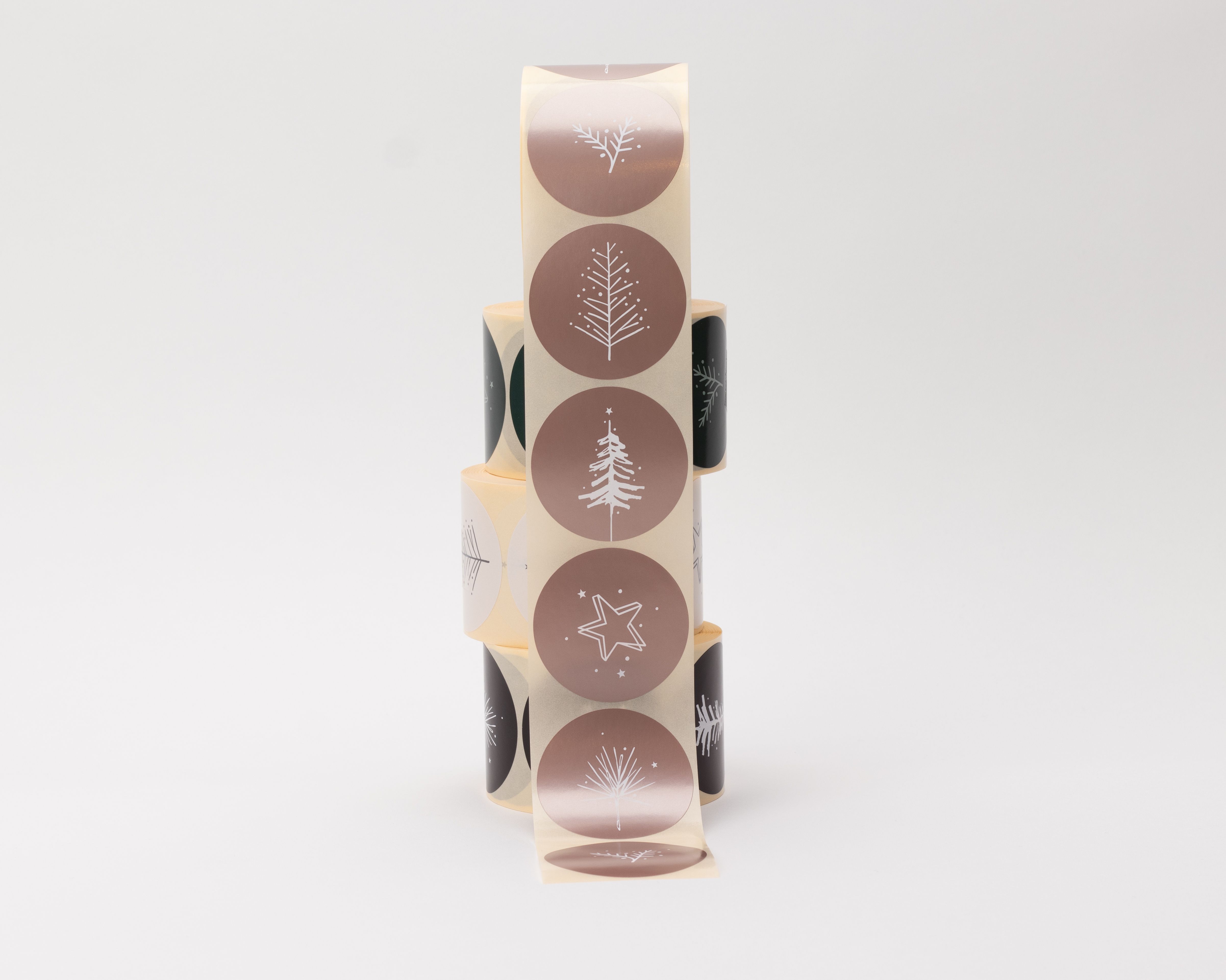 Aufkleber in rosa metallic mit verschiedenen weißen Skandi Weihnachts-Motiven wie Tannenbäumen, Sternen und Zweigen