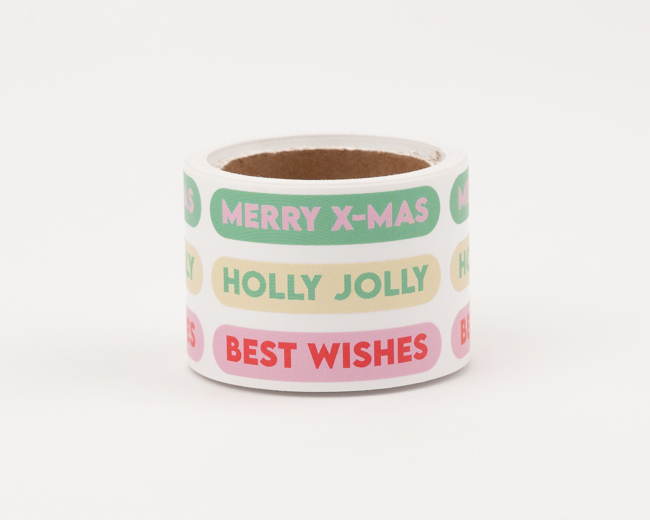 Aufkleber mit verschiedenen festlichen Designs. Rosa, Rot, Grün, Pink und Elfenbein kombiniert mit Weihnachtsgrüßen