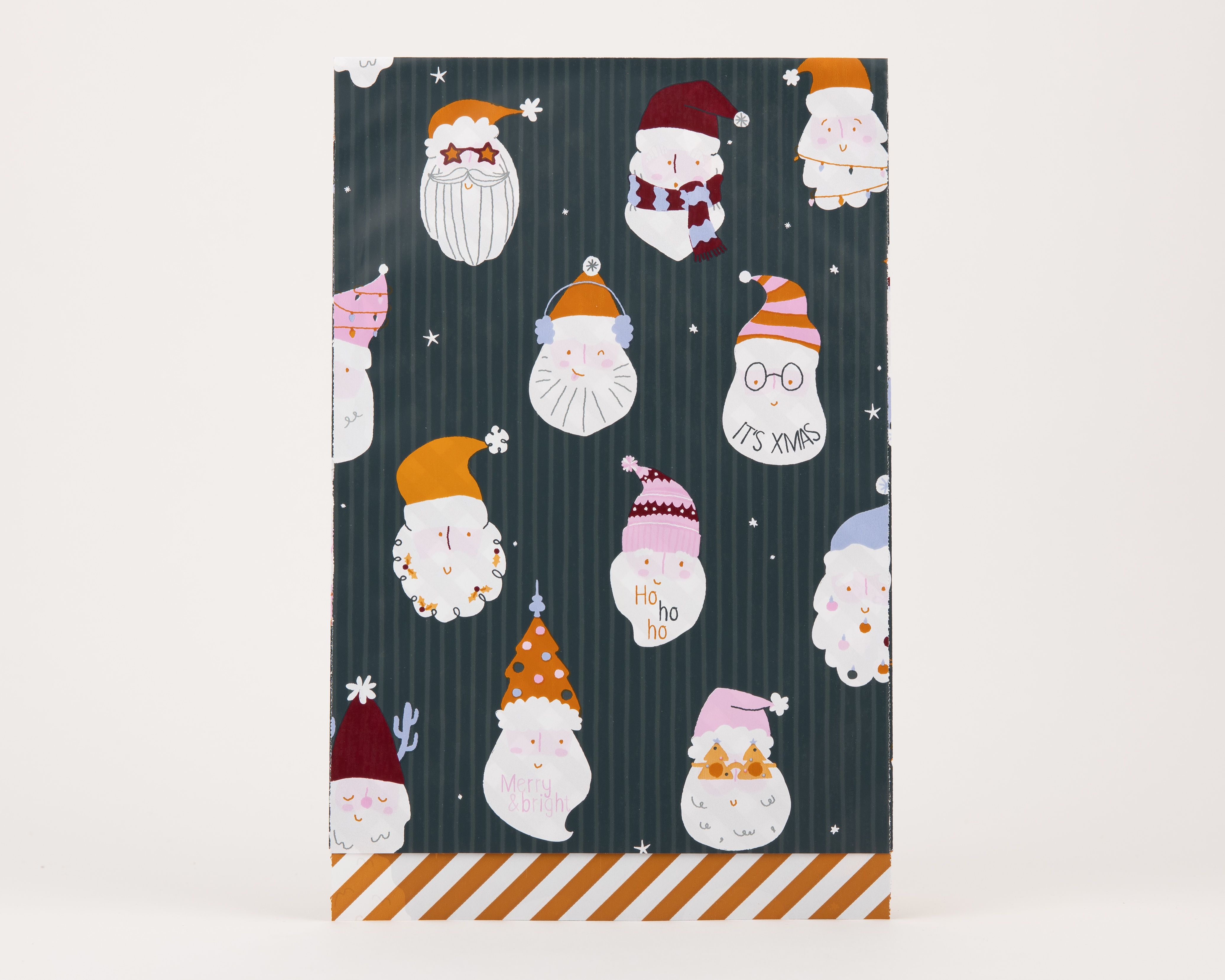 Papiertüten Flachbeutel mit einem bunten Crazy Santa Motiv auf petrolfarbenem Hintergrund und einer Innenseite mit ockerfarbenen diagonalen Streifen