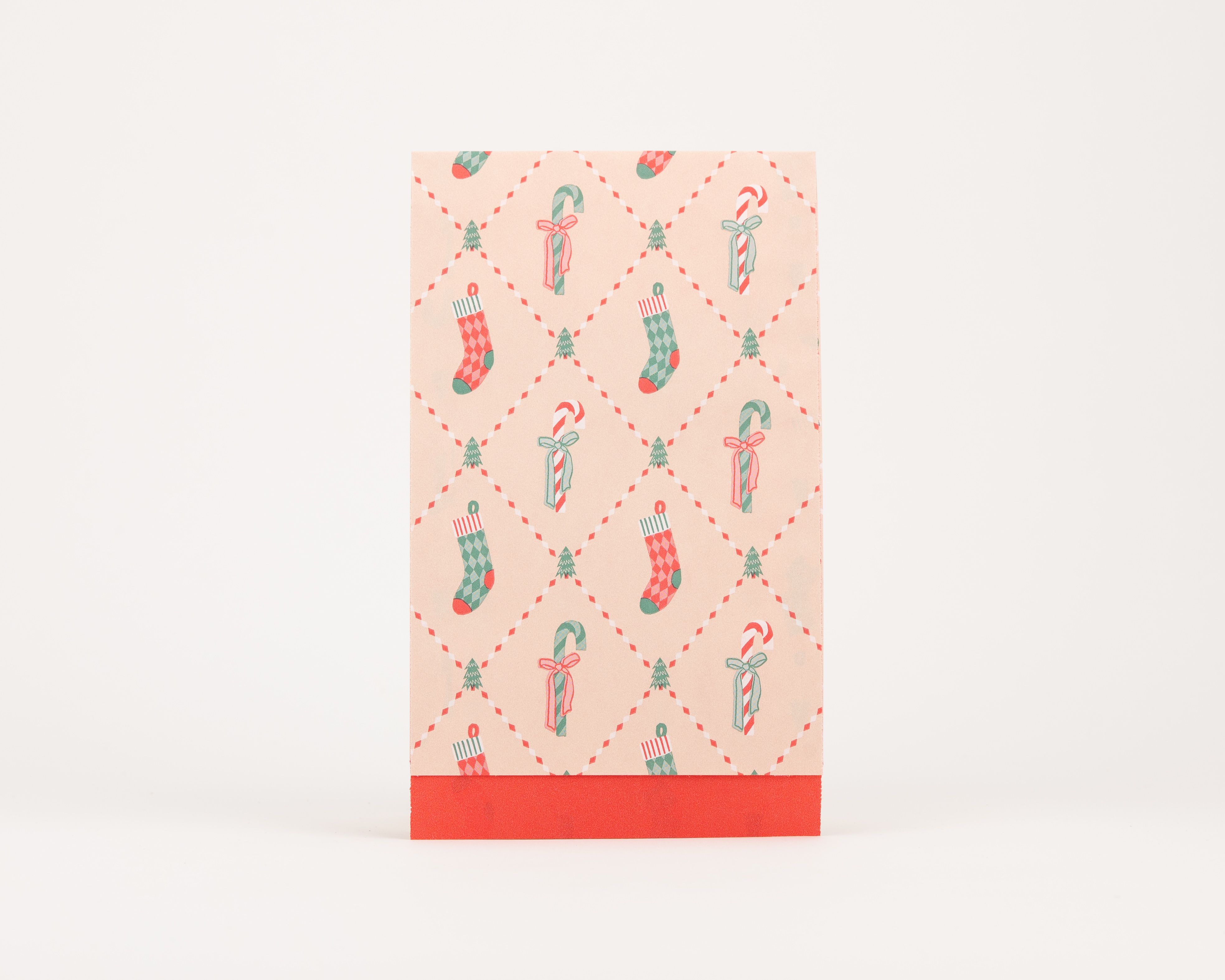 Papiertüten Flachbeutel mit beigem Hintergrund und einem Retro-Weihnachtsmuster in Rot und Grün Die Innenseite ist einfarbig Rot
