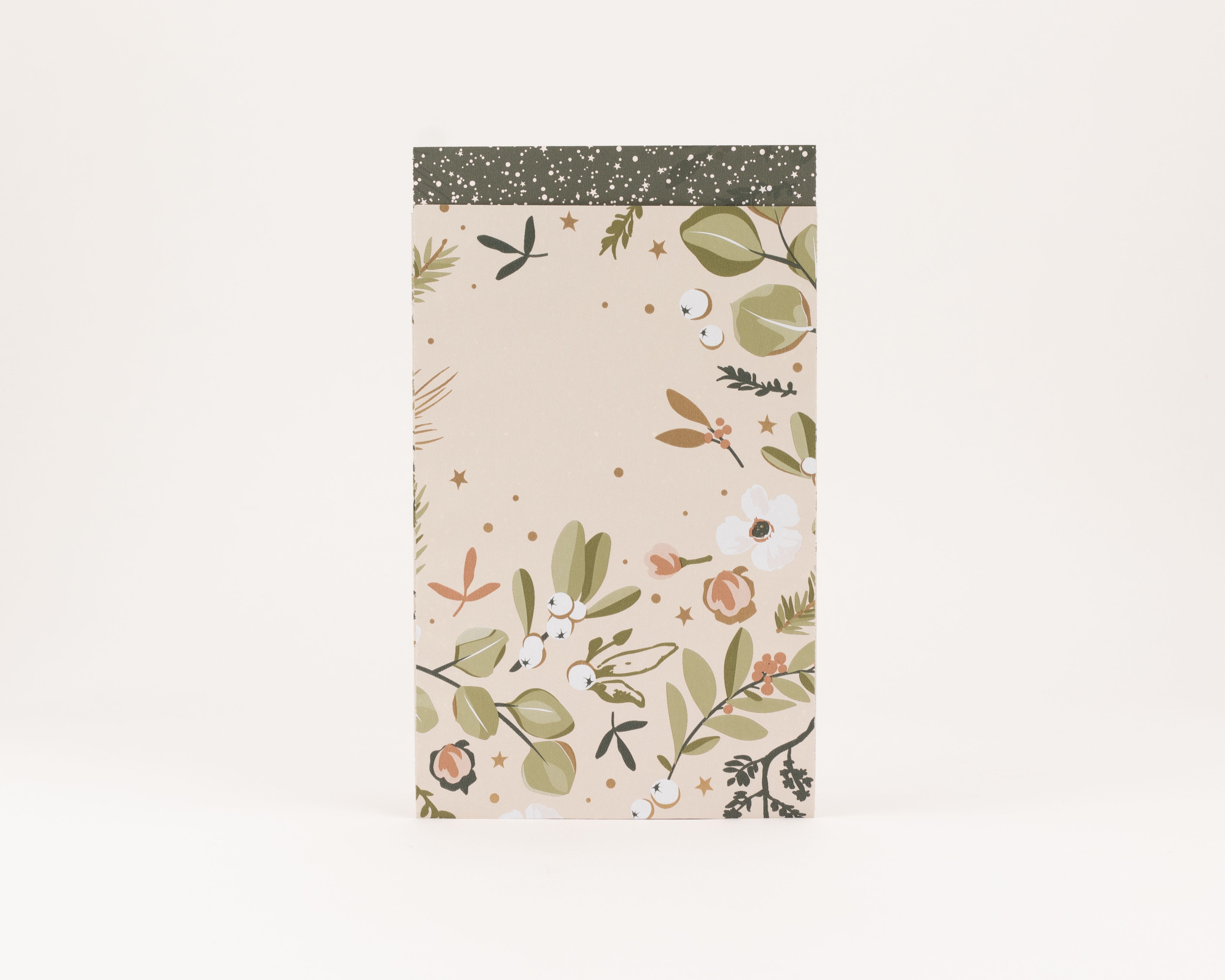 Flachbeutel in Blush Beige mit floralem Wintergarten-Muster und Goldeffekt, Innenseite dunkelgrün mit weißen Sternen und Punkten