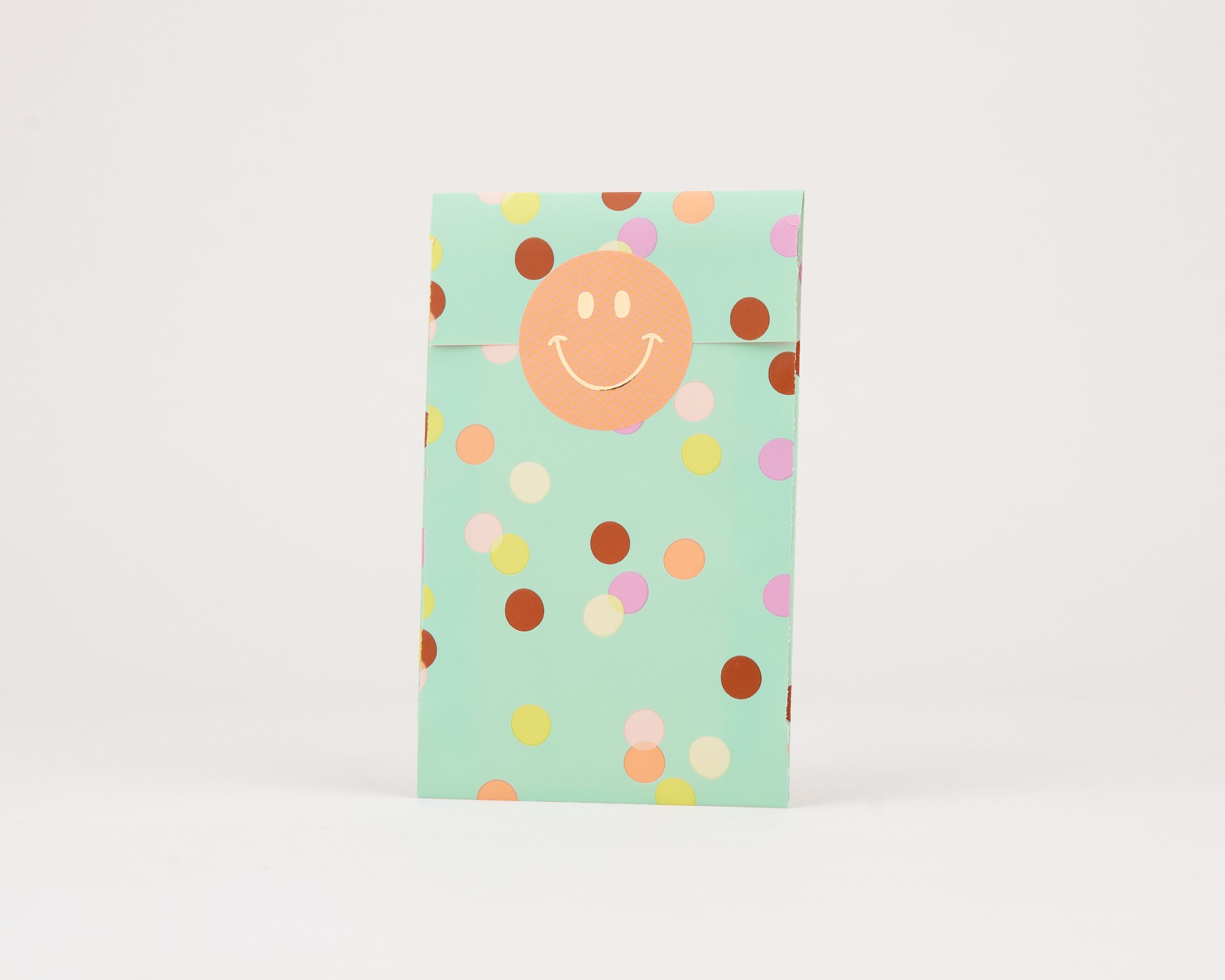 Papiertüten Flachbeutel in Minze mit bunten Konfetti Punkten in Orange, Pink, Gelb und Braun. Die Innenseite ist ebenfalls mintgrün